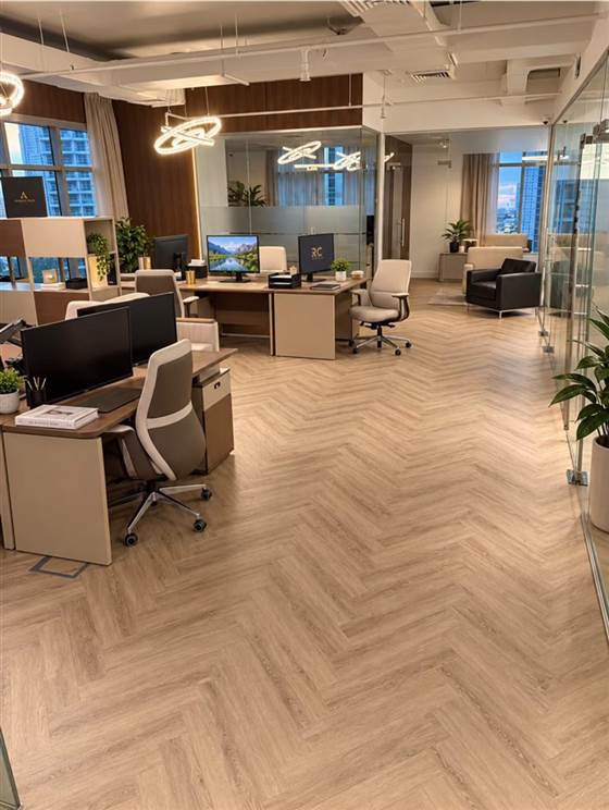 Royal Contract Investment Dubai office — open workspace